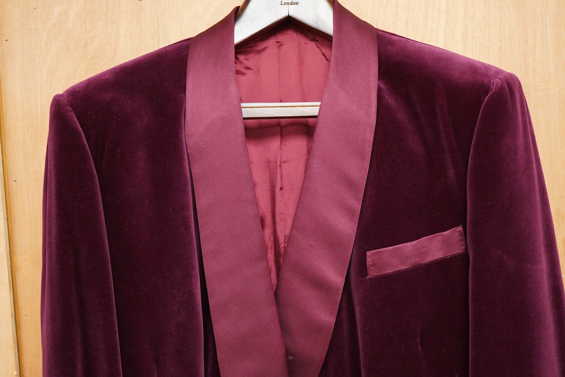 The property of a titled gentleman: A Redwood & Feller maroon velvet mid 20th century gentleman’s smoking jacket, with maroon silk cuff and collar detail, front chest 56cm.